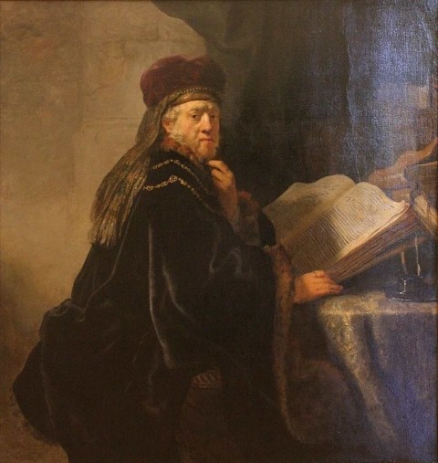 Rembrandt_-_A_Scholar_Seated_at_a_Desk