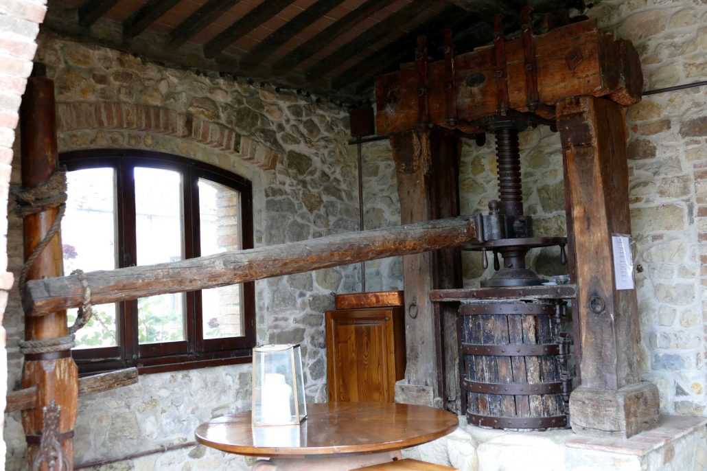 1000135 Antique wine press at Rocca delle Macie