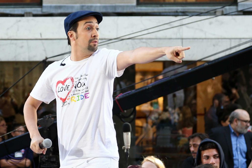 Lin Manuel Miranda pointing and engaging with a crowd