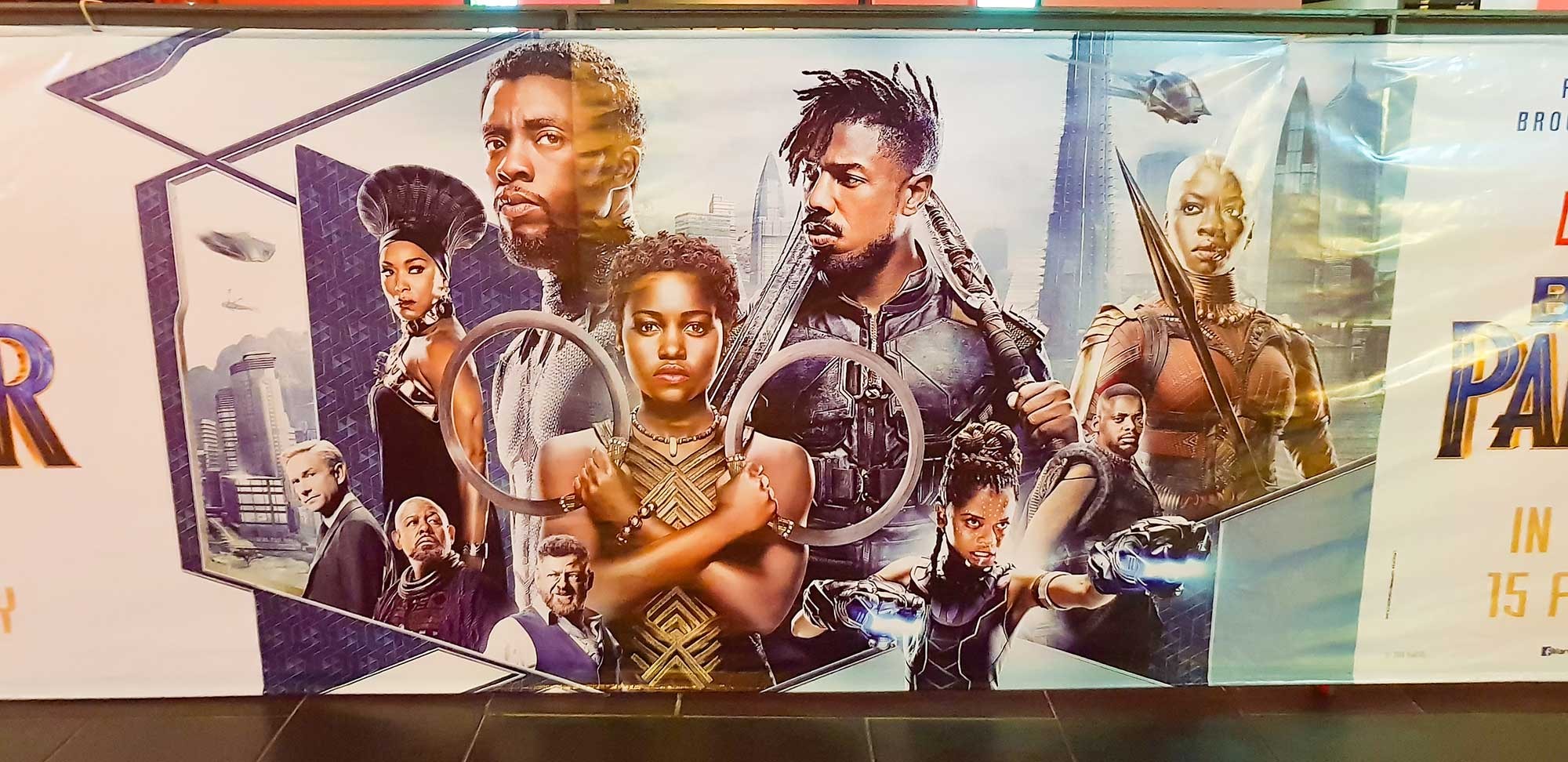 Black Panther movie poster, with characters from Wakanda