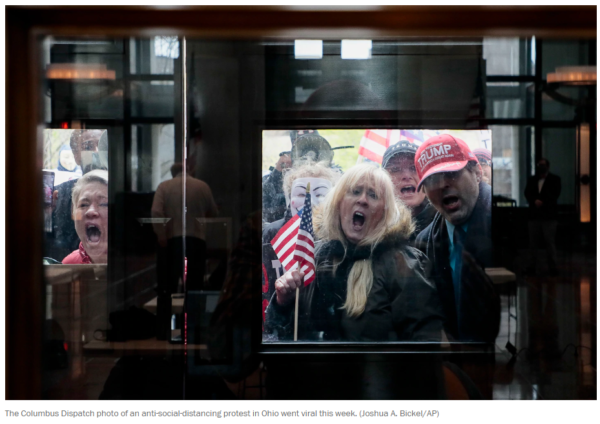 Creepy looking people in Trump hats pressed up against a window at the Ohio statehouse screaming.