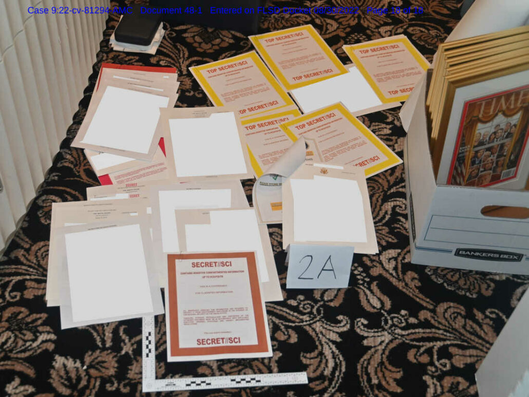 photo of classified document folders on the floor of Trump's office