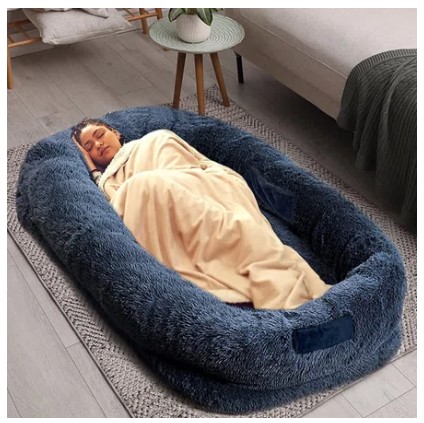 Giant dog bed with person in it