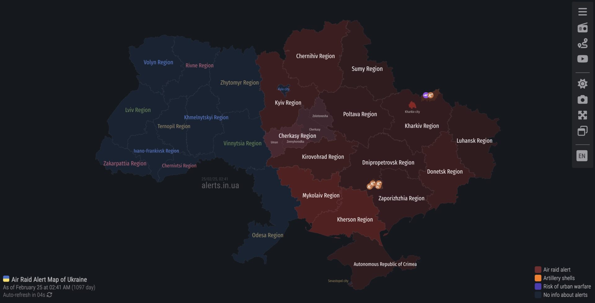 Air raid alert map of Ukraine in English. All of eastern and central Ukraine is colored red indicating it is under air raid alert.