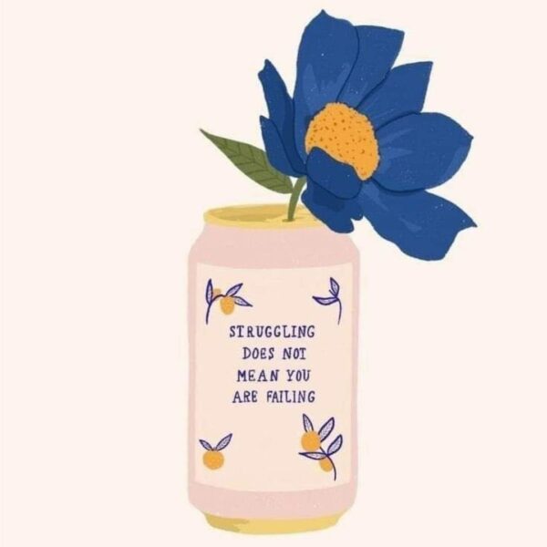 Blue flower in a vase: Struggling doesn't mean you are failing