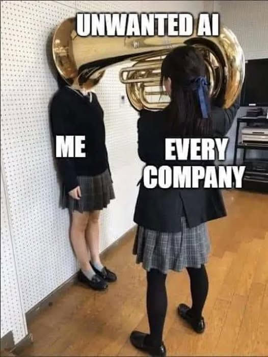 Meme showing a girl with a tuba over the face of another girl. 