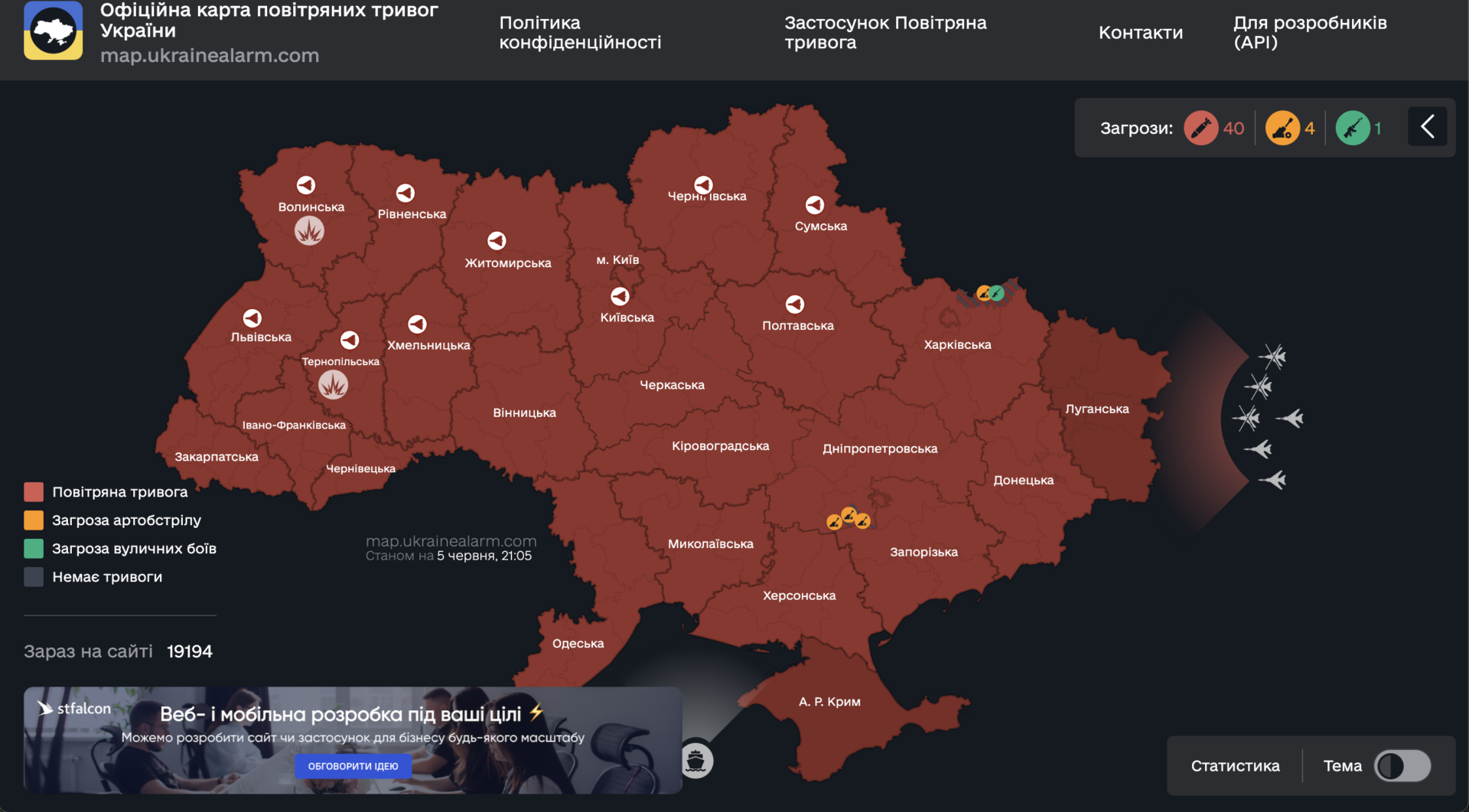 Air raid alert map of Ukraine. All of Ukraine is colored in different shades of red indicated threats from Russian drones, missiles, and/or bombs. Russian bombers are indicated in white on the right side of the map.