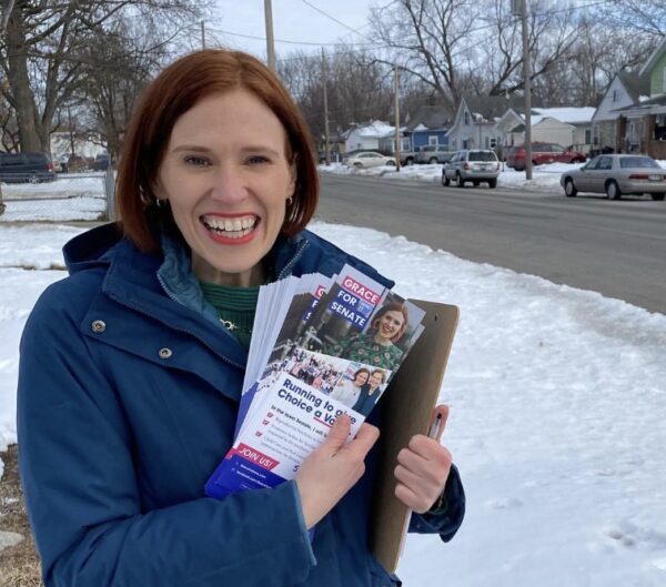 Iowa Candidate Grace canvassing on a snowy street